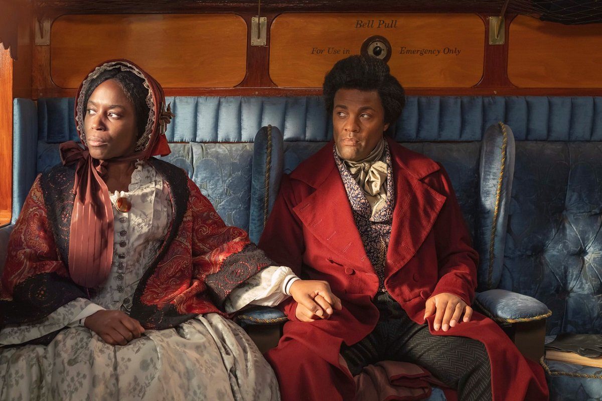 A Black couple from 19th century in train