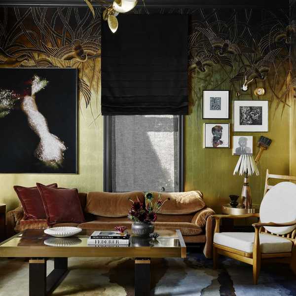 a curated living room with feathers on the upper walls