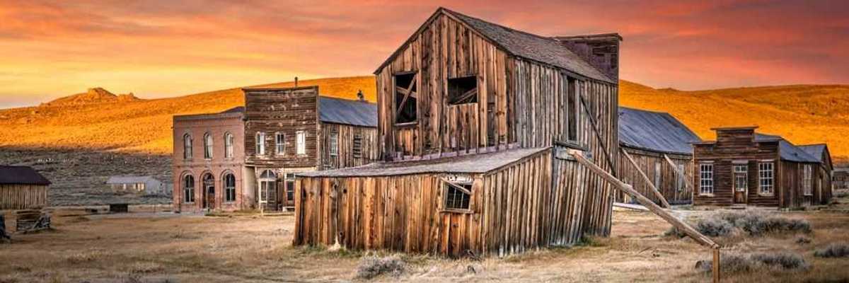 a ghost town in the sunset