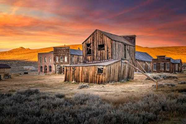 a ghost town in the sunset