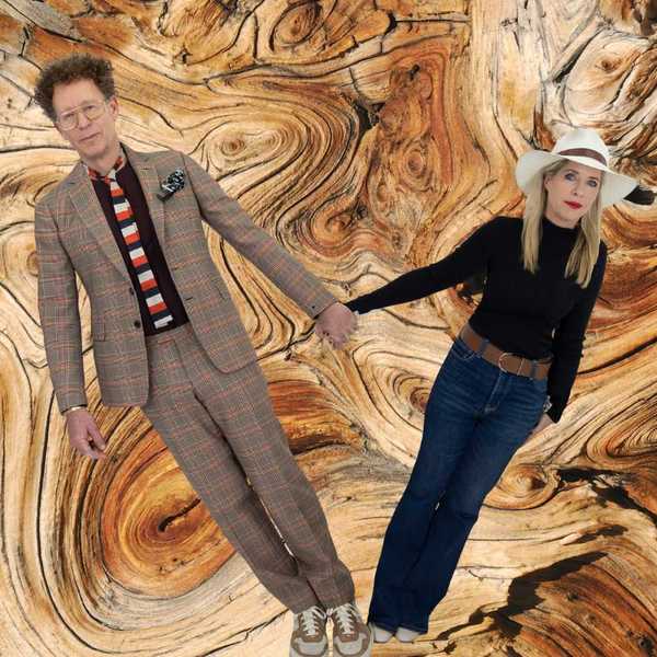 A man and women of holding hands in front of a tree ring patterned background