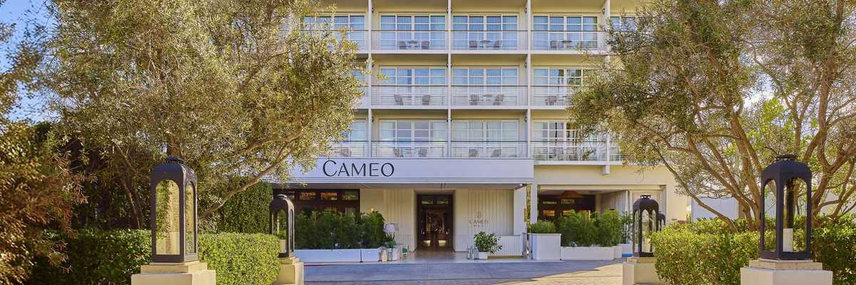 a md-century modern hotel with a grid of private patios