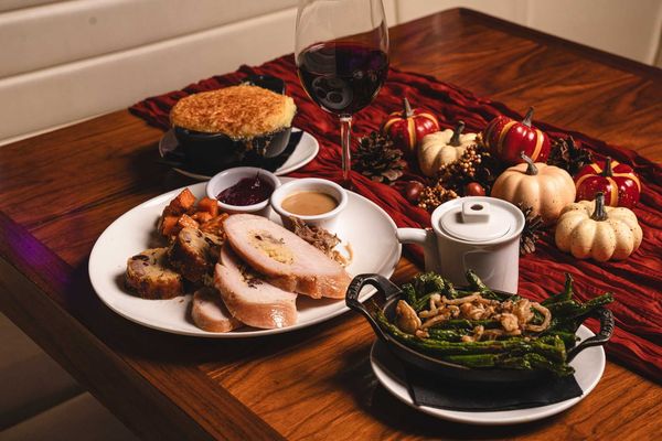 a roasted turkey dinner set up for christmas