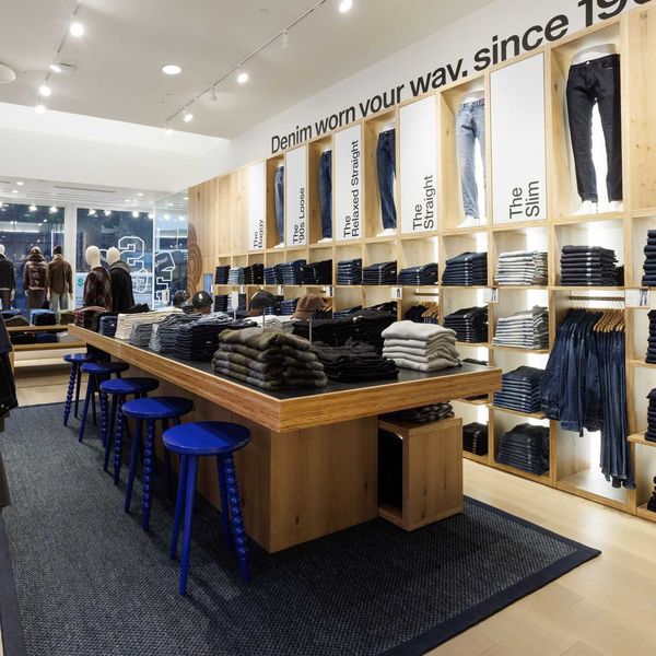A store with a denim table and denim wall