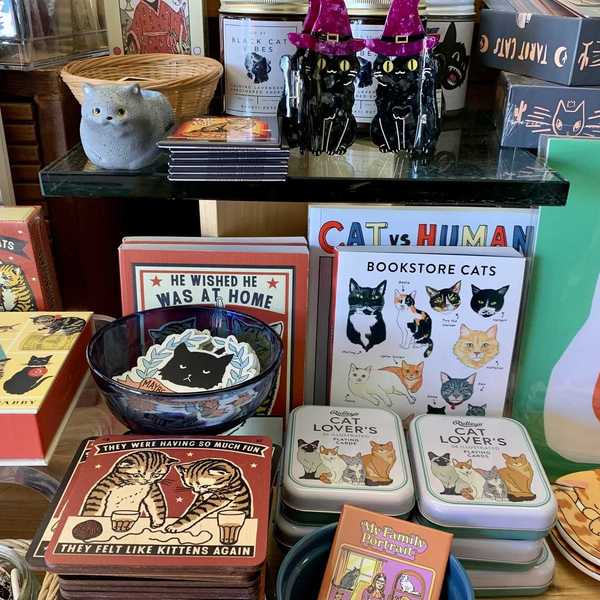 a table with cat-themed gifts
