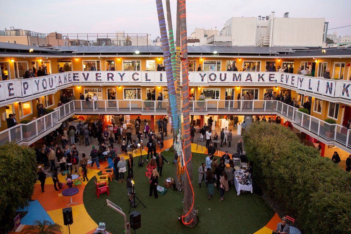 An art fair in the courtyard of a motel