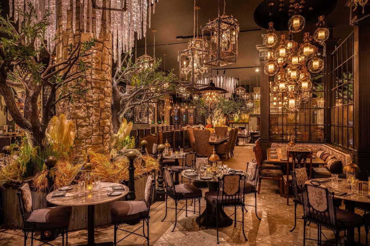 an atmospheric restaurant with hanging lanterns