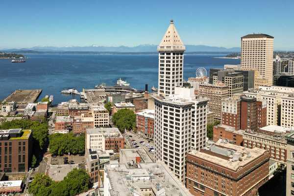 buildings of downtown seattle with the bay in the background