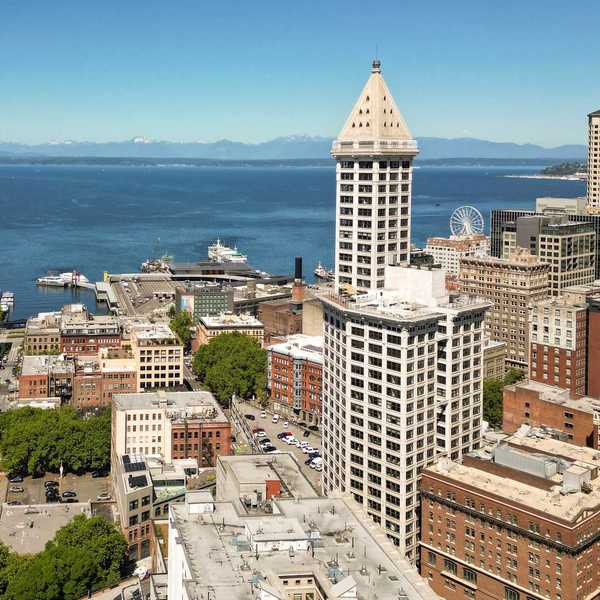 buildings of downtown seattle with the bay in the background