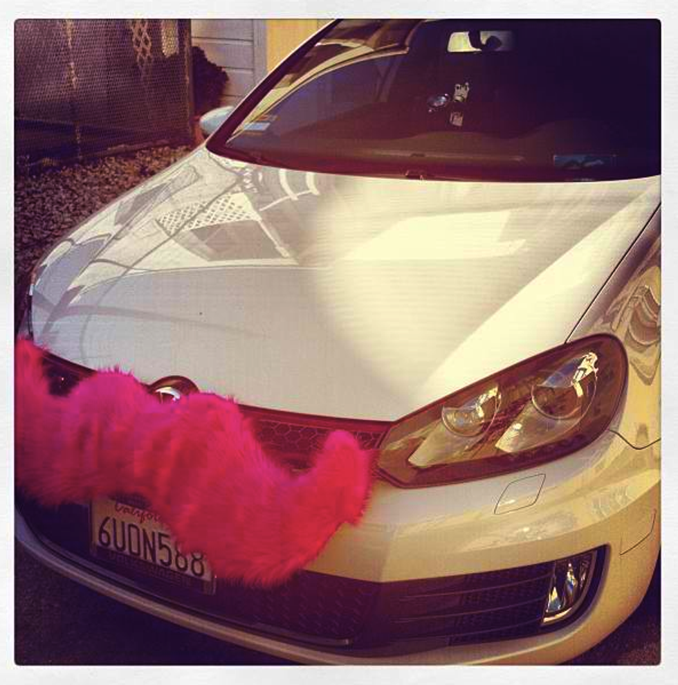 Lyft Ride-Sharing Cars Are The Ones Sporting Pink Mustaches