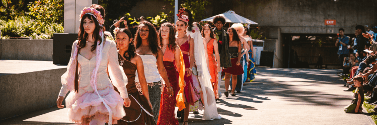 fashion models walking an outdoor runway