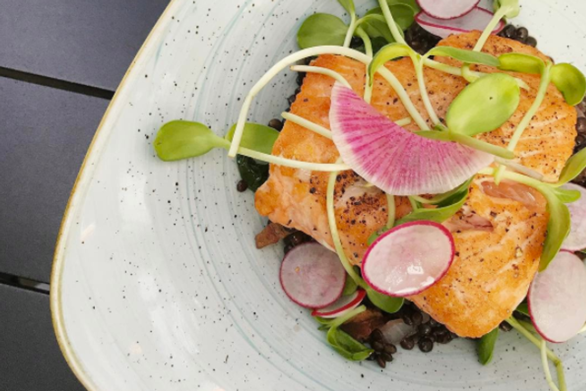 Fresh oysters with a side of wine.