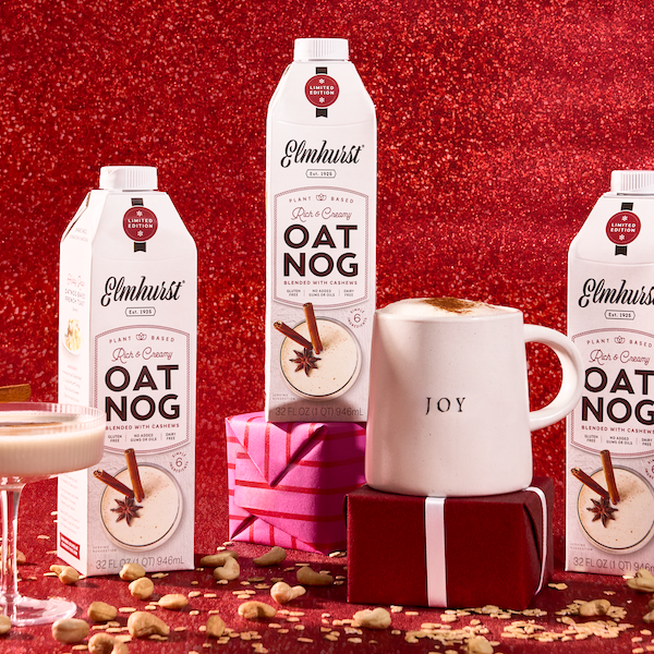 glasses and cartons of plant-based oat nog from Elmhurst