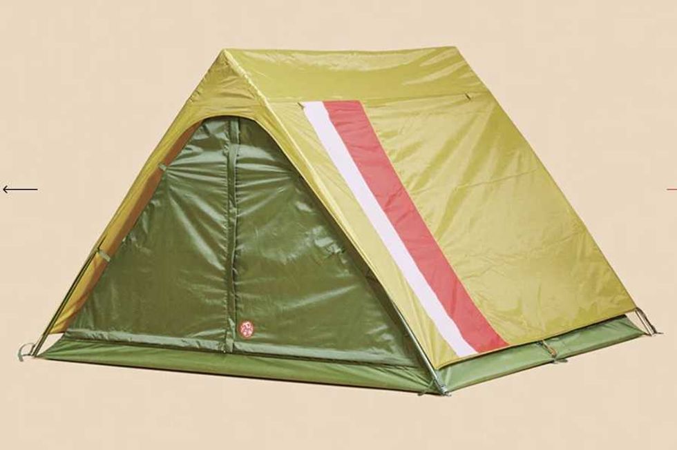 Green and yellow A-frame tent with a red and white stripe on a beige background.