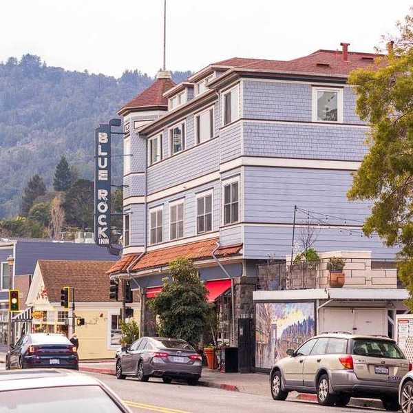 historic downtown main street set against tree covered hills