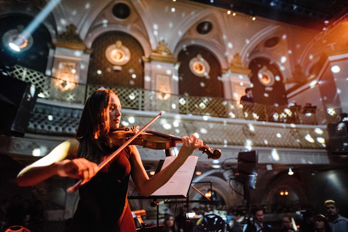 Experience 1920s French Underground Culture With Aerial Dancers, Burlesque + EDM