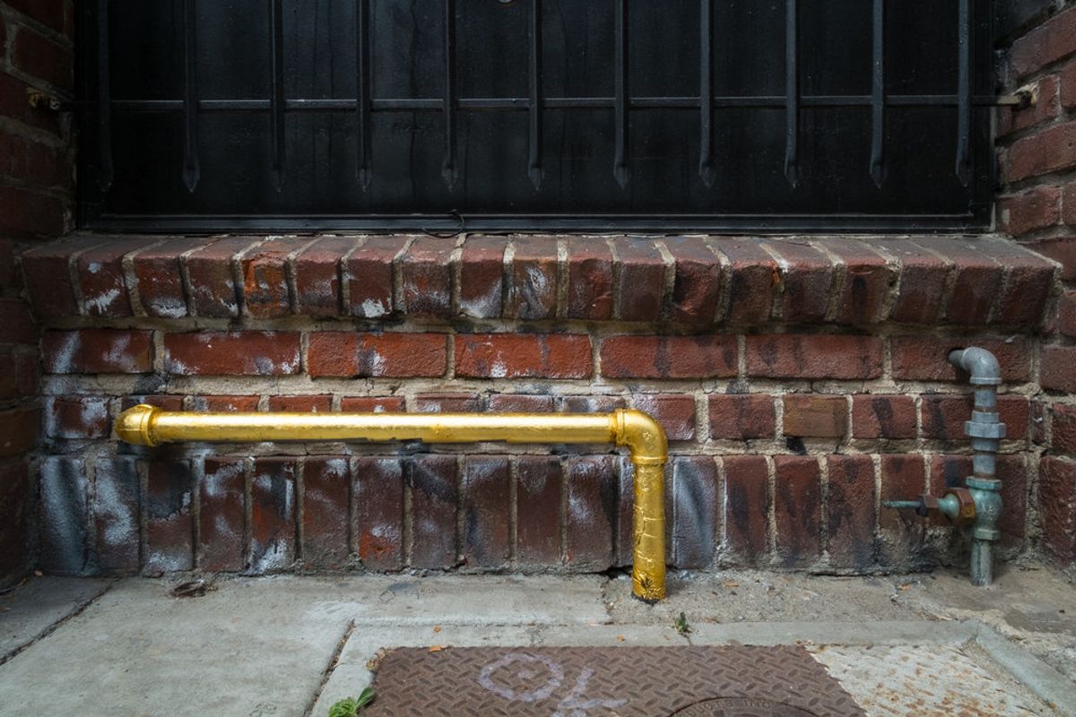 Guerrilla artist gilds street objects in comment on the high cost of Bay Area life