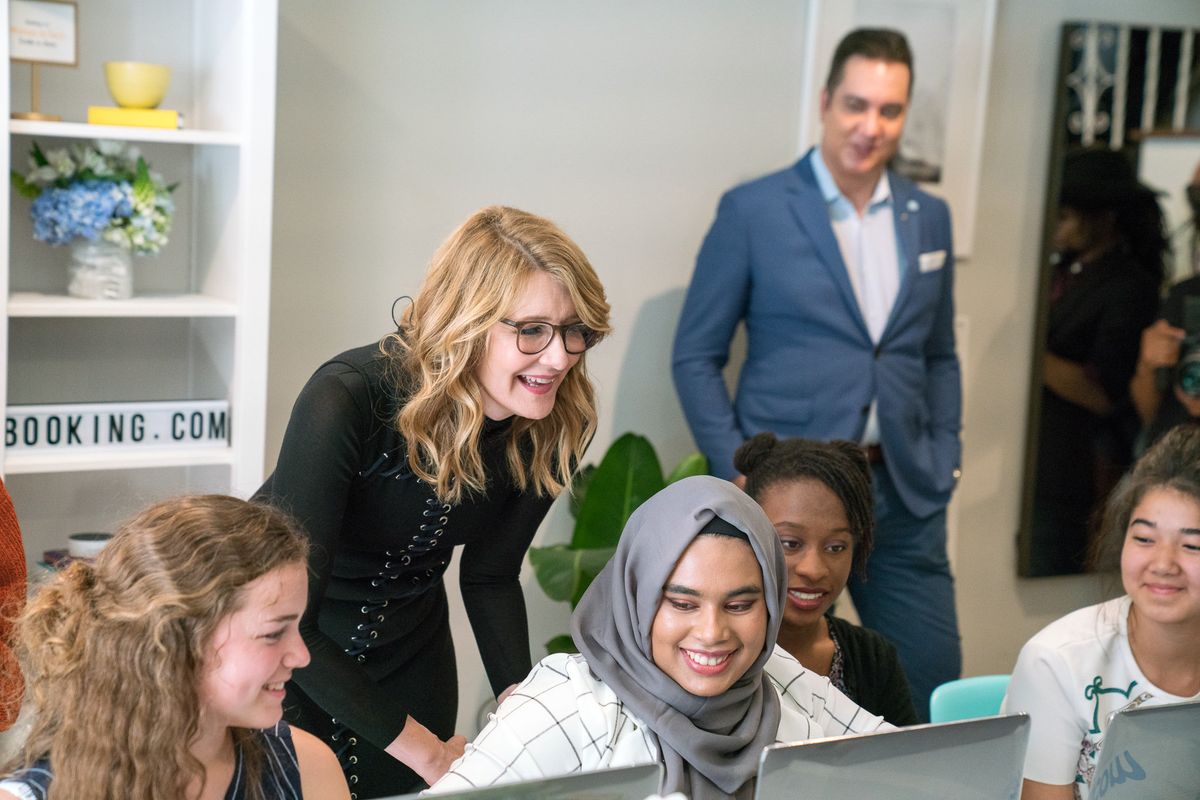 Actress Laura Dern announces Booking.com's STEM scholarships for girls at an SF code-a-thon