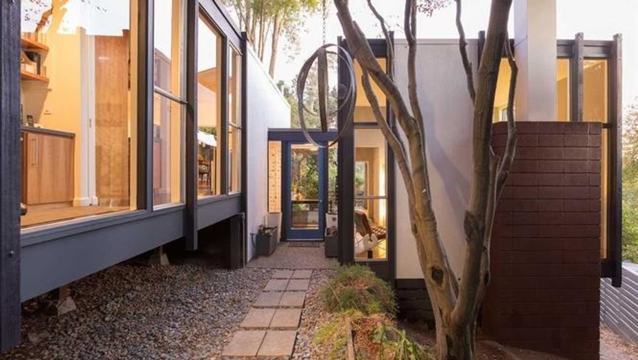 Mid-century modern house with wooded views in Oakland asks $1.15 million