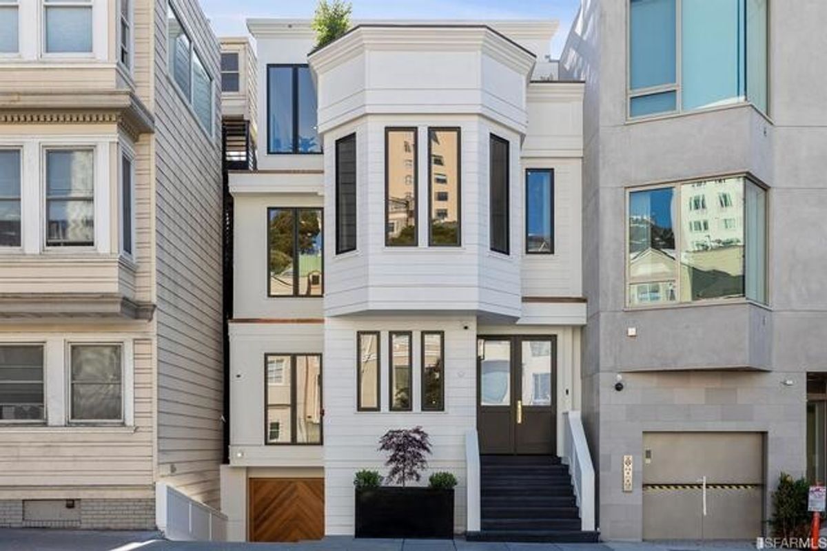 Our dark hearts are lusting after this moody, modernized Victorian on Polk Street, asking $7.8 million