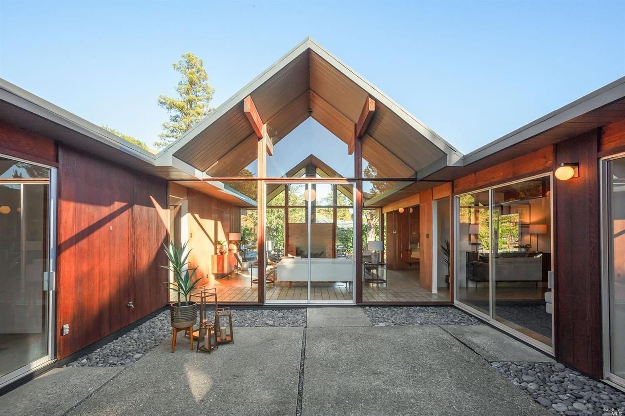 An Eichler double A-frame with a pool in San Rafael asks $1.9 million