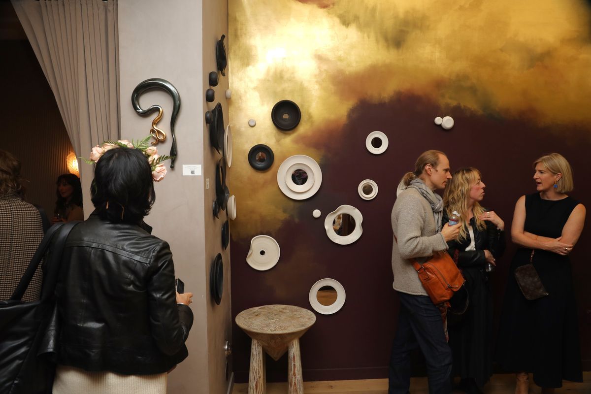 Hundreds celebrate the opening of 7x7 Social Club's Vacant to Vibrant pop-up.