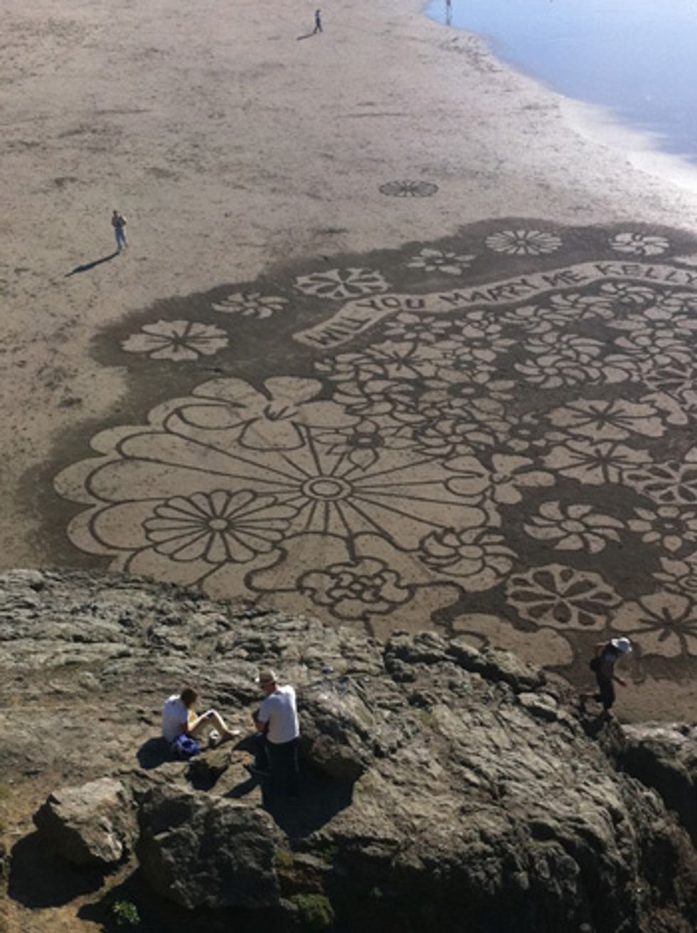 Sand-Written Wedding Proposal at Ocean Beach