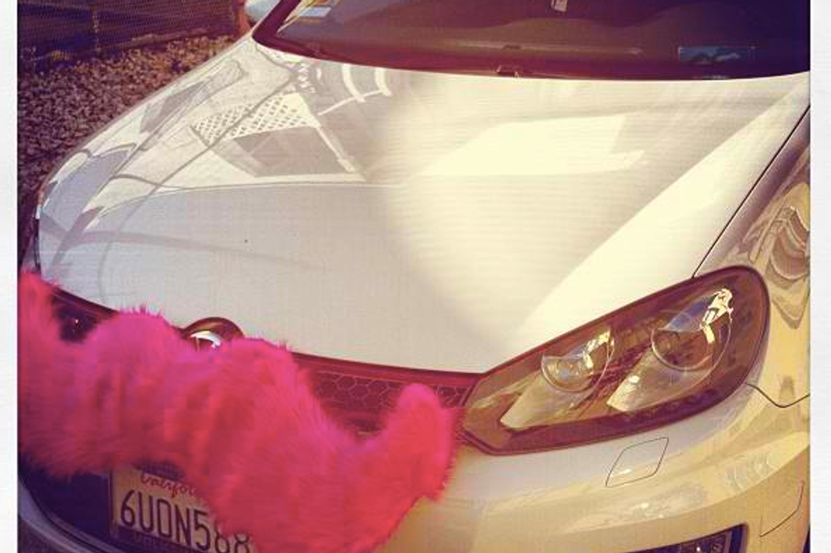 Lyft Ride-Sharing Cars Are The Ones Sporting Pink Mustaches