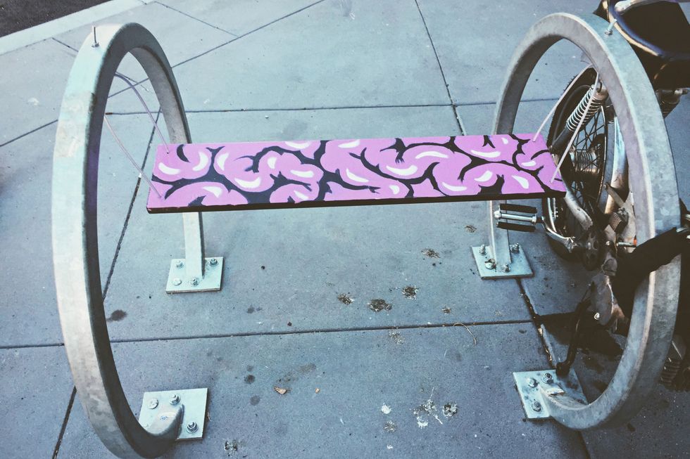 Anonymous Artist Installs Seats on Bike Racks Around SF