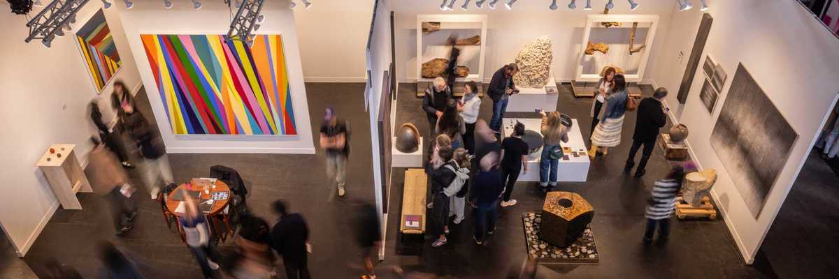people in a gallery from above