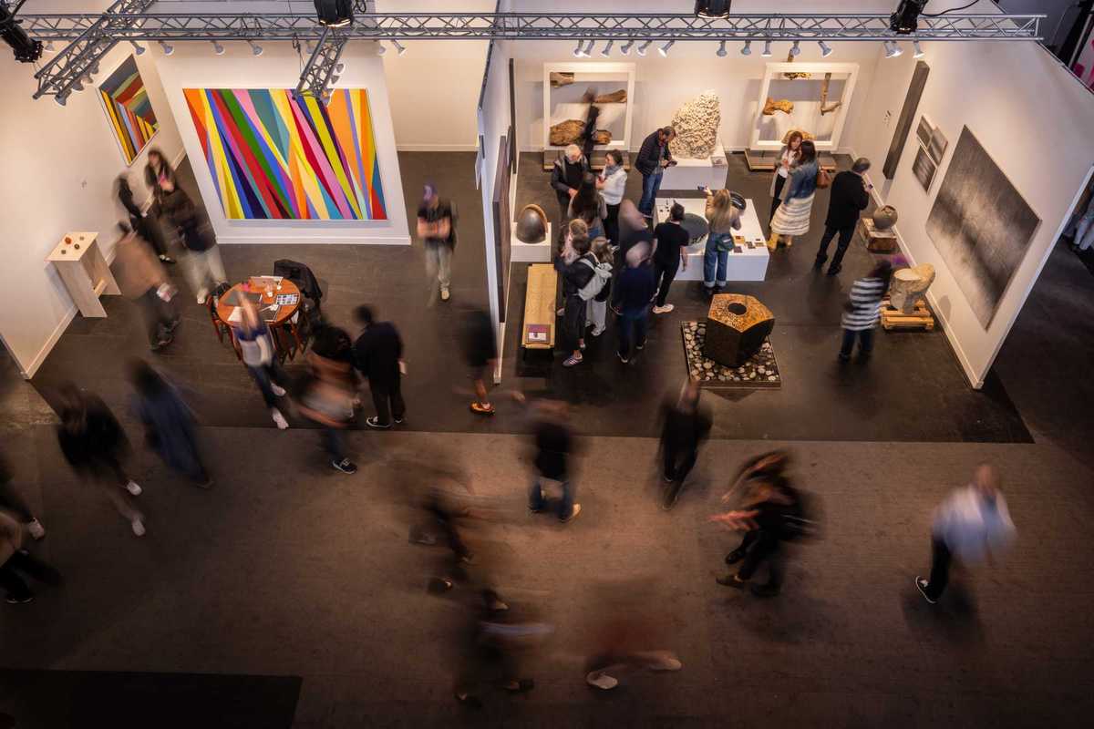 people in a gallery from above