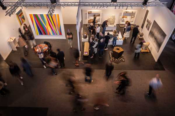 people in a gallery from above