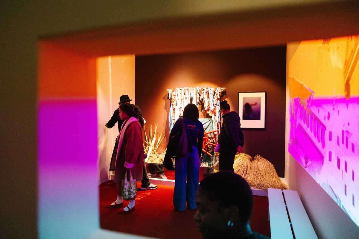 people in a gallery looking at art