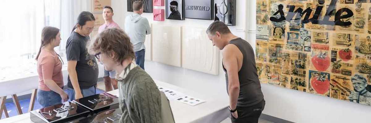 people looking at art in a gallery