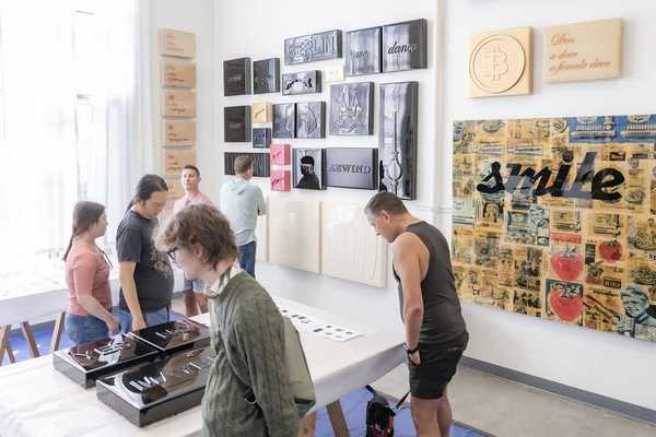 people looking at art in a gallery