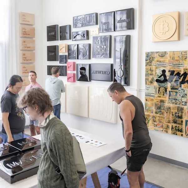 people looking at art in a gallery