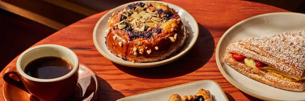 Russian pastries, cookies, and coffee on a table