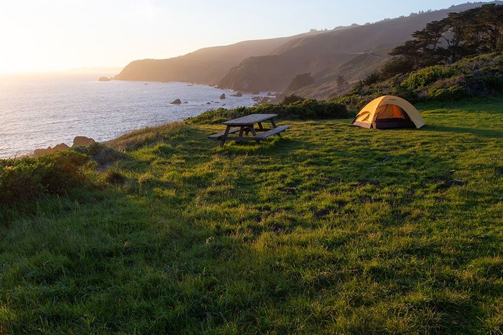 The Slide Ranch camping meadow sits atop the Marin coast for perfect sunsets.